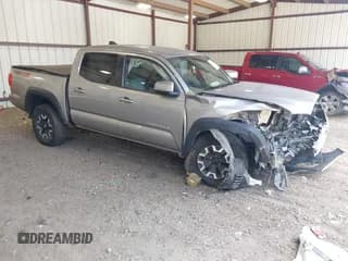 ✅ 2020 Toyota Tacoma SR5 • VIN: 5TFCZ5AN7LX217468 • Lot: 42678736. Listed on IAAI with 120,000 mi. Free auction sales archive from the USA and detailed vehicle history report at DreamBid. Image 1.