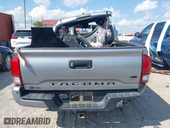 ✅ 2019 Toyota Tacoma SR • VIN: 5TFCZ5AN9KX204946 • Лот: 43123693. Опубликован ранее на IAAI с пробегом Не указан. Бесплатный доступ к архиву аукционных продаж из США и подробный отчёт об истории автомобиля на DreamBid. Изображение 15.