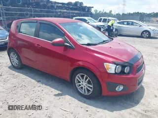 2012 Chevrolet Sonic LT z VIN 1G1JC6SH1C4124124, wystawiony jako IAAI lot #42660400 z przebiegiem 88 677 mil mil oraz . Historia ofert i sprzedaży dostępna na DreamBid. Obrazek 1.