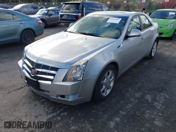 ✅ 2008 Cadillac CTS AWD • VIN: 1G6DS57V380193771 • Lot: 43552987. Listed on IAAI with 124,817 mi. Free auction sales archive from the USA and detailed vehicle history report at DreamBid. Image 2.