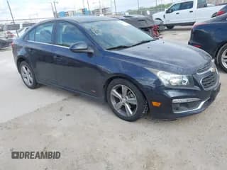 ✅ 2015 Chevrolet Cruze LT • VIN: 1G1PE5SB6F7120924 • Lot: 43413053. Listed on IAAI with 99,234 mi. Free auction sales archive from the USA and detailed vehicle history report at DreamBid. Image 1.