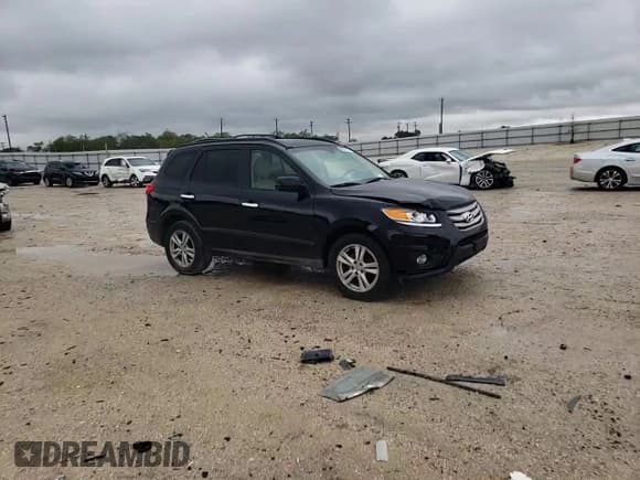 ✅ 2012 Hyundai Santa Fe Limited • VIN: 5XYZK4AG6CG110778 • Lot: 69934314. Listed on Copart with 172,850 mi. Free auction sales archive from the USA and detailed vehicle history report at DreamBid. Image 12.