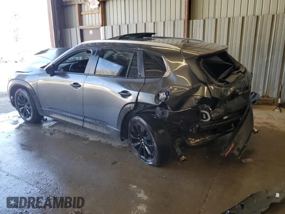 ✅ 2024 Mazda CX-50 S Premium • VIN: 7MMVABDMXRN173083 • Lot: 54336165. Listed on Copart with 11,410 mi. Free auction sales archive from the USA and detailed vehicle history report at DreamBid. Image 2.