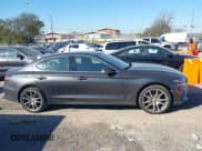 ✅ 2023 Genesis G70 2.0T • VIN: KMTG34TA4PU131180 • Lot: 43634271. Wystawiony na IAAI z przebiegiem 14 615 mil. Bezpłatny archiwum sprzedaży aukcyjnych z USA i szczegółowy raport historii pojazdu na DreamBid. Zdjęcie 13.