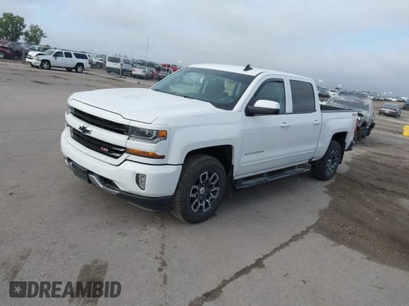 ✅ 2018 Chevrolet Silverado 1500 LT • VIN: 3GCUKREC8JG443934 • Lot: 43266162. Listed on IAAI with 79,404 mi. Free auction sales archive from the USA and detailed vehicle history report at DreamBid. Image 2.