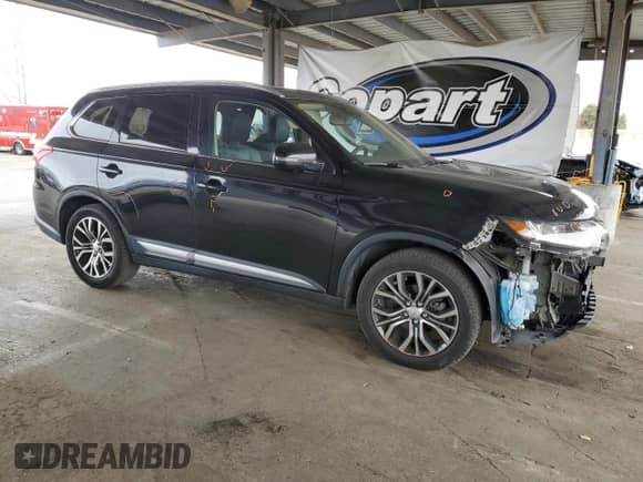 2017 Mitsubishi Outlander SE with VIN JA4AD3A30HZ042947, listed as a Copart auction lot 71544805 with 173,811 mi miles and Salvage title. Bid and sale history available at DreamBid. Image 4.