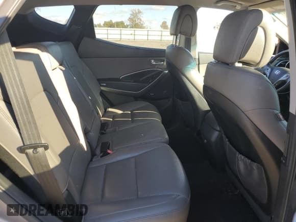 ✅ 2015 Hyundai Santa Fe • VIN: 5XYZWDLA0FG251461 • Lot: 90425665. Listed on Copart with 131,044 mi. Free auction sales archive from the USA and detailed vehicle history report at DreamBid. Image 11.