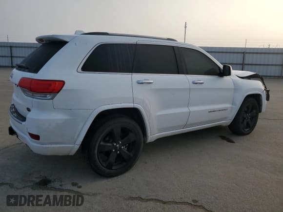 ✅ 2016 Jeep Grand Cherokee Overland • VIN: 1C4RJFCM9GC332730 • Lot: 86407904. Listed on Copart with 158,693 mi. Free auction sales archive from the USA and detailed vehicle history report at DreamBid. Image 3.