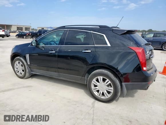 ✅ 2015 Cadillac SRX • VIN: 3GYFNAE33FS623242 • Lot: 70728425. Wystawiony na Copart z przebiegiem 121 701 mil. Bezpłatny archiwum sprzedaży aukcyjnych z USA i szczegółowy raport historii pojazdu na DreamBid. Zdjęcie 2.