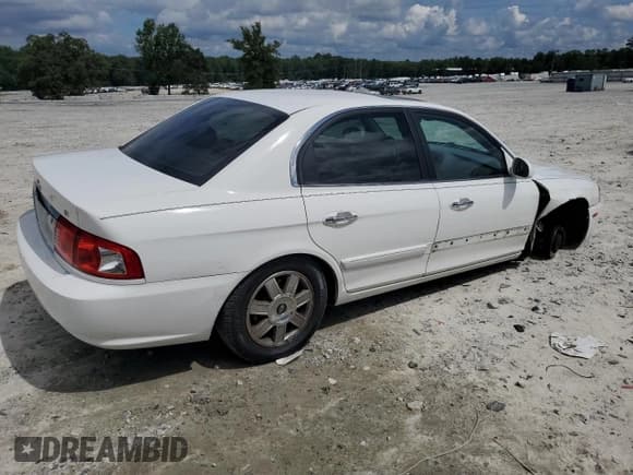 ✅ 2004 Kia Optima LX • VIN: KNAGD126245358152 • Lot: 69034695. Wystawiony na Copart z przebiegiem 143 007 mil. Bezpłatny archiwum sprzedaży aukcyjnych z USA i szczegółowy raport historii pojazdu na DreamBid. Zdjęcie 3.