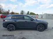 ✅ 2025 Mazda CX-50 S Premium Plus • VIN: 7MMVABEM8SN373156 • Лот: 43582168. Опубликован ранее на IAAI с пробегом 8 594 миль. Бесплатный доступ к архиву аукционных продаж из США и подробный отчёт об истории автомобиля на DreamBid. Изображение 14.