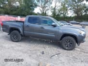 ✅ 2020 Toyota Tacoma SR5 • VIN: 3TMAZ5CN0LM129386 • Lot: 43242623. Listed on IAAI with 35,673 mi. Free auction sales archive from the USA and detailed vehicle history report at DreamBid. Image 13.