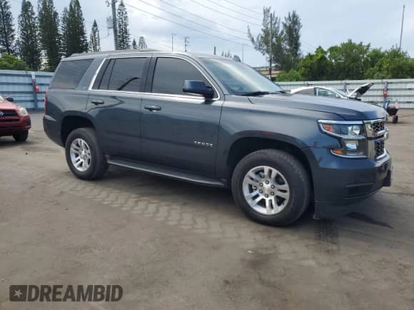 2020 Chevrolet Tahoe LT z VIN 1GNSKBKC7LR117538, wystawiony jako Copart lot #82119935 z przebiegiem 100 701 mil mil oraz Czysty tytuł • Clean title. Historia ofert i sprzedaży dostępna na DreamBid. Obrazek 4.