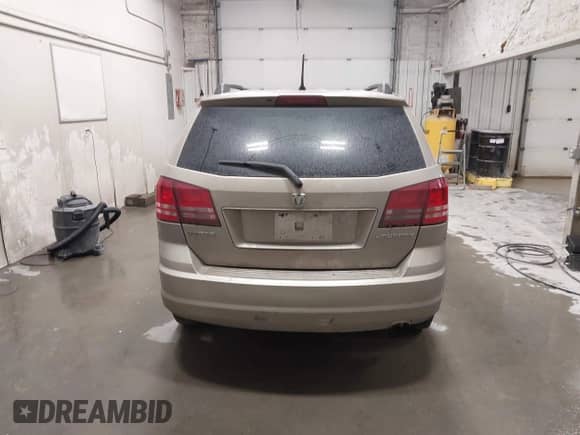 2009 Dodge Journey SE z VIN 3D4GG47B99T561583, wystawiony jako IAAI lot #43402002 z przebiegiem 137 189 mil mil oraz . Historia ofert i sprzedaży dostępna na DreamBid. Obrazek 16.