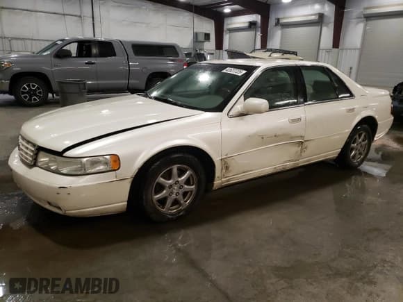 ✅ 2002 Cadillac Seville Luxury SLS • VIN: 1G6KS54Y42U249237 • Лот: 42627725. Опубликован ранее на Copart с пробегом 131 897 миль. Бесплатный доступ к архиву аукционных продаж из США и подробный отчёт об истории автомобиля на DreamBid. Изображение 1.