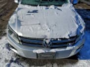 ✅ 2013 Volkswagen Tiguan S • VIN: WVGBV3AX9DW076127 • Lot: 95407465. Listed on Copart with 137,444 mi. Free auction sales archive from the USA and detailed vehicle history report at DreamBid. Image 12.