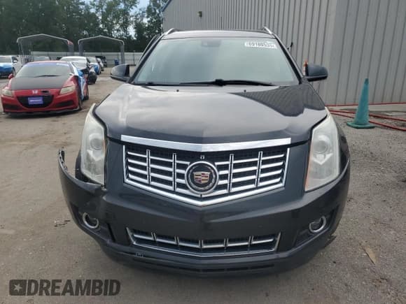 ✅ 2015 Cadillac SRX Premium Collection • VIN: 3GYFNDE39FS623019 • Lot: 69189535. Listed on Copart with 82,679 mi. Free auction sales archive from the USA and detailed vehicle history report at DreamBid. Image 5.