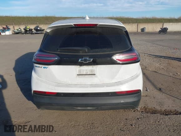 ✅ 2022 Chevrolet Bolt EV 1LT • VIN: 1G1FW6S06N4100590 • Lot: 41338049. Listed on IAAI with 133,115 mi. Free auction sales archive from the USA and detailed vehicle history report at DreamBid. Image 16.