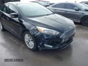 ✅ 2017 Ford Focus Titanium • VIN: 1FADP3J26HL267951 • Lot: 43728220. Listed on IAAI with 84,043 mi. Free auction sales archive from the USA and detailed vehicle history report at DreamBid. Image 6.