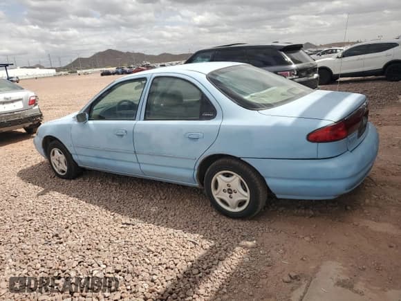 ✅ 1998 Ford Contour LX • VIN: 1FAFP66LXWK197384 • Lot: 51519385. Listed on Copart with 56,958 mi. Free auction sales archive from the USA and detailed vehicle history report at DreamBid. Image 2.