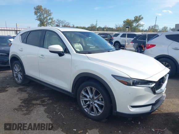 ✅ 2019 Mazda CX-5 Grand Touring • VIN: JM3KFADM1K1677914 • Лот: 43627333. Опубликован ранее на IAAI с пробегом 109 565 миль. Бесплатный доступ к архиву аукционных продаж из США и подробный отчёт об истории автомобиля на DreamBid. Изображение 1.