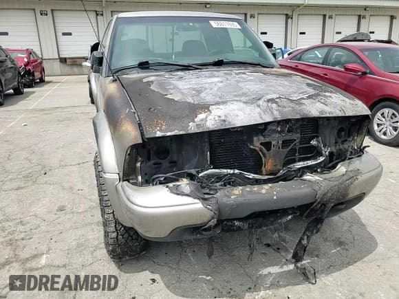 ✅ 2003 GMC Sonoma SLS • VIN: 1GTCT19X938201721 • Lot: 56011695. Listed on Copart with Not provided. Free auction sales archive from the USA and detailed vehicle history report at DreamBid. Image 14.