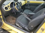 ✅ 2014 Volkswagen Beetle 2.0L TDI • VIN: 3VWJL7AT0EM609099 • Лот: 76802164. Опубликован ранее на Copart с пробегом Не указан. Бесплатный доступ к архиву аукционных продаж из США и подробный отчёт об истории автомобиля на DreamBid. Изображение 8.