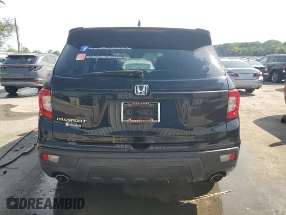 ✅ 2021 Honda Passport EX-L • VIN: 5FNYF7H52MB008733 • Lot: 70511625. Listed on Copart with 75,441 mi. Free auction sales archive from the USA and detailed vehicle history report at DreamBid. Image 6.