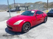 ✅ 2004 Nissan 350Z Touring • VIN: JN1AZ34E94T051487 • Лот: 42360337. Опубликован ранее на IAAI с пробегом 185 534 миль. Бесплатный доступ к архиву аукционных продаж из США и подробный отчёт об истории автомобиля на DreamBid. Изображение 2.