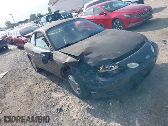 ✅ 2000 Ford Escort ZX2 • VIN: 3FAKP1139YR235632 • Lot: 42240451. Listed on IAAI with 139,532 mi. Free auction sales archive from the USA and detailed vehicle history report at DreamBid. Image 1.