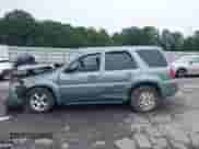 2006 Mercury Mariner Luxury with VIN 4M2YU57196KJ01063, listed as a IAAI auction lot 42907986 with Not provided miles and . Bid and sale history available at DreamBid. Image 14.