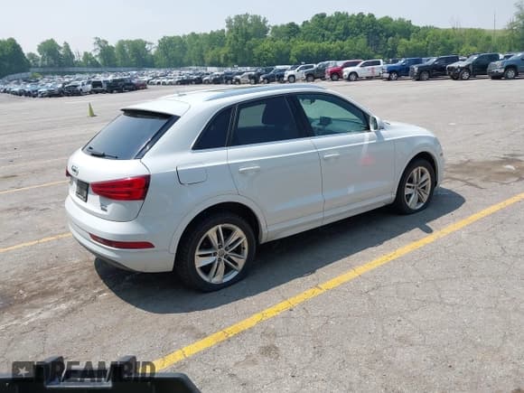 ✅ 2016 Audi Q3 Premium Plus • VIN: WA1EFCFSXGR014289 • Lot: 42440711. Listed on IAAI with 120,765 mi. Free auction sales archive from the USA and detailed vehicle history report at DreamBid. Image 4.