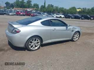 2007 Hyundai Tiburon GT с VIN KMHHN66F37U254514, выставлен на аукционе IAAI как лот 42953171 с пробегом 109 831 миль миль и . История ставок и продаж доступна на DreamBid. Изображение 4.