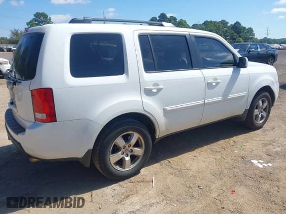 ✅ 2011 Honda Pilot EX-L • VIN: 5FNYF3H71BB002820 • Lot: 42821577. Listed on IAAI with 167,697 mi. Free auction sales archive from the USA and detailed vehicle history report at DreamBid. Image 4.
