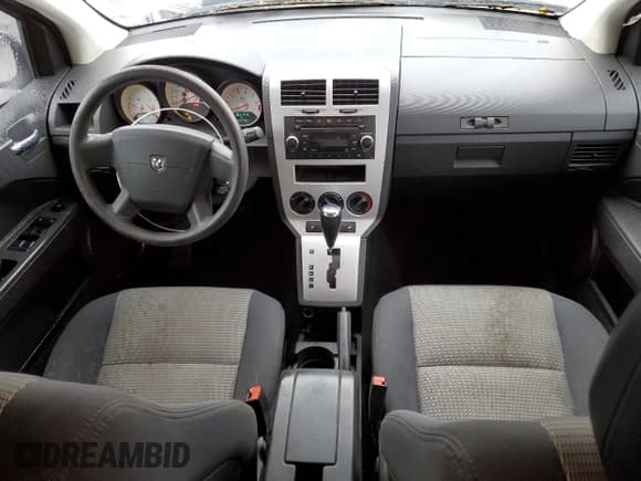 ✅ 2009 Dodge Caliber SXT • VIN: 1B3HB48A39D133201 • Лот: 81983404. Опубликован ранее на Copart с пробегом 225 187 миль. Бесплатный доступ к архиву аукционных продаж из США и подробный отчёт об истории автомобиля на DreamBid. Изображение 8.