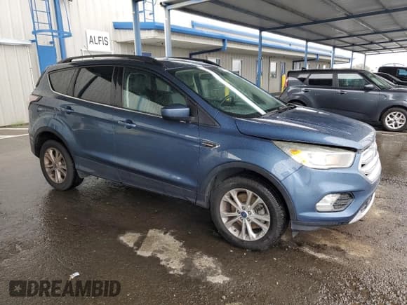 ✅ 2018 Ford Escape SE • VIN: 1FMCU9GDXJUA32474 • Лот: 82325705. Опубликован ранее на Copart с пробегом 149 996 миль. Бесплатный доступ к архиву аукционных продаж из США и подробный отчёт об истории автомобиля на DreamBid. Изображение 4.
