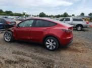 ✅ 2024 Tesla Model Y Long Range • VIN: 7SAYGDEE2RA258805 • Lot: 69405855. Listed on Copart with 13,620 mi. Free auction sales archive from the USA and detailed vehicle history report at DreamBid. Image 2.