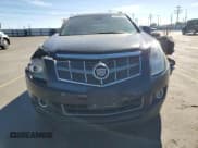 ✅ 2012 Cadillac SRX Performance Collection • VIN: 3GYFNEE37CS645859 • Lot: 87452835. Listed on Copart with 135,893 mi. Free auction sales archive from the USA and detailed vehicle history report at DreamBid. Image 5.