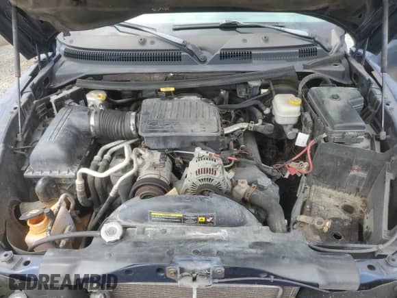 2007 Dodge Dakota SLT z VIN 1D7HW48P17S172567, wystawiony jako Copart lot #70854984 z przebiegiem 156 148 mil mil oraz Czysty tytuł • Clean title. Historia ofert i sprzedaży dostępna na DreamBid. Obrazek 11.