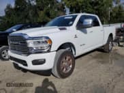 ✅ 2024 Ram 2500 Laramie • VIN: 3C6UR5FL0RG355174 • Lot: 82612145. Listed on Copart with 22,099 mi. Free auction sales archive from the USA and detailed vehicle history report at DreamBid. Image 1.