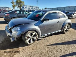 ✅ 2014 Volkswagen Beetle Turbo R-Line • VIN: 3VWVT7ATXEM616644 • Лот: 84953625. Опубликован ранее на Copart с пробегом 101 582 миль. Бесплатный доступ к архиву аукционных продаж из США и подробный отчёт об истории автомобиля на DreamBid. Изображение 1.