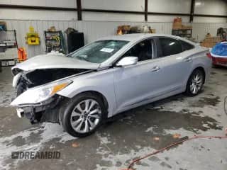 2014 Hyundai Azera z VIN KMHFG4JG0EA355997, wystawiony jako Copart lot #59851335 z przebiegiem Nie podano mil oraz Szkoda całkowita • Salvage title. Historia ofert i sprzedaży dostępna na DreamBid. Obrazek 1.