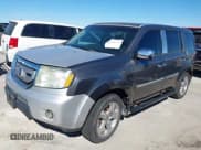 ✅ 2012 Honda Pilot EX-L • VIN: 5FNYF3H62CB022552 • Lot: 43556702. Listed on IAAI with 213,233 mi. Free auction sales archive from the USA and detailed vehicle history report at DreamBid. Image 17.