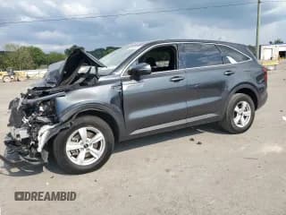 ✅ 2023 Kia Sorento LX • VIN: 5XYRGDLC2PG168405 • Лот: 66840945. Опубликован ранее на Copart с пробегом 51 495 миль. Бесплатный доступ к архиву аукционных продаж из США и подробный отчёт об истории автомобиля на DreamBid. Изображение 1.
