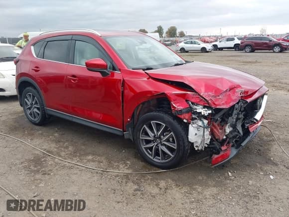 ✅ 2018 Mazda CX-5 Grand Touring • VIN: JM3KFADM4J0432206 • Lot: 43723615. Listed on IAAI with 81,130 mi. Free auction sales archive from the USA and detailed vehicle history report at DreamBid. Image 1.