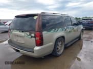 ✅ 2011 Chevrolet Suburban LT • VIN: 1GNSCJE03BR289587 • Lot: 42160401. Listed on IAAI with 204,005 mi. Free auction sales archive from the USA and detailed vehicle history report at DreamBid. Image 4.