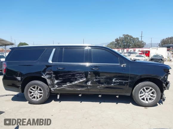 ✅ 2021 Chevrolet Suburban LT • VIN: 1GNSKCKD9MR263360 • Lot: 42205517. Wystawiony na IAAI z przebiegiem 127 733 mil. Bezpłatny archiwum sprzedaży aukcyjnych z USA i szczegółowy raport historii pojazdu na DreamBid. Zdjęcie 14.