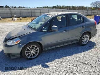 ✅ 2008 Suzuki SX4 Convenience • VIN: JS2YC415685101656 • Lot: 50065385. Listed on Copart with 288,495 mi. Free auction sales archive from the USA and detailed vehicle history report at DreamBid. Image 1.