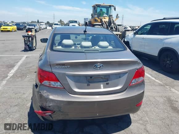 2014 Hyundai Accent GLS with VIN KMHCT4AE8EU655136, listed as a IAAI auction lot 42797016 with 102,554 mi miles and . Bid and sale history available at DreamBid. Image 16.