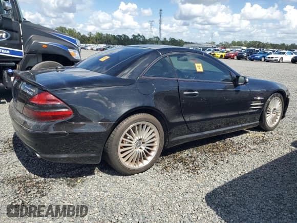 ✅ 2005 Mercedes-Benz SL 55 AMG • VIN: WDBSK74F55F099184 • Лот: 73728304. Опубликован ранее на Copart с пробегом Не указан. Бесплатный доступ к архиву аукционных продаж из США и подробный отчёт об истории автомобиля на DreamBid. Изображение 3.